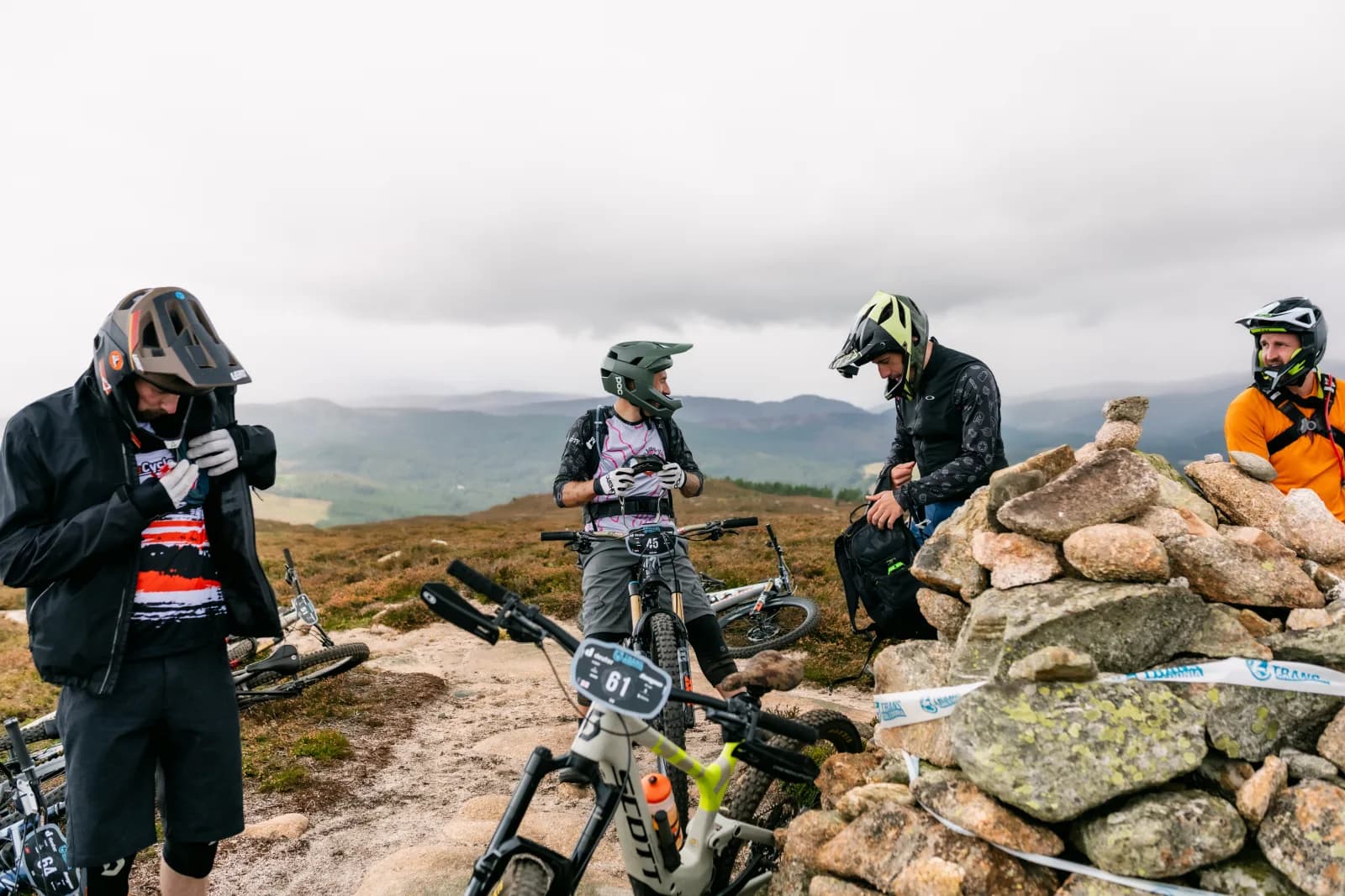Riders preparing at a moor-top location on the final day of Trans Caledonia 2026.