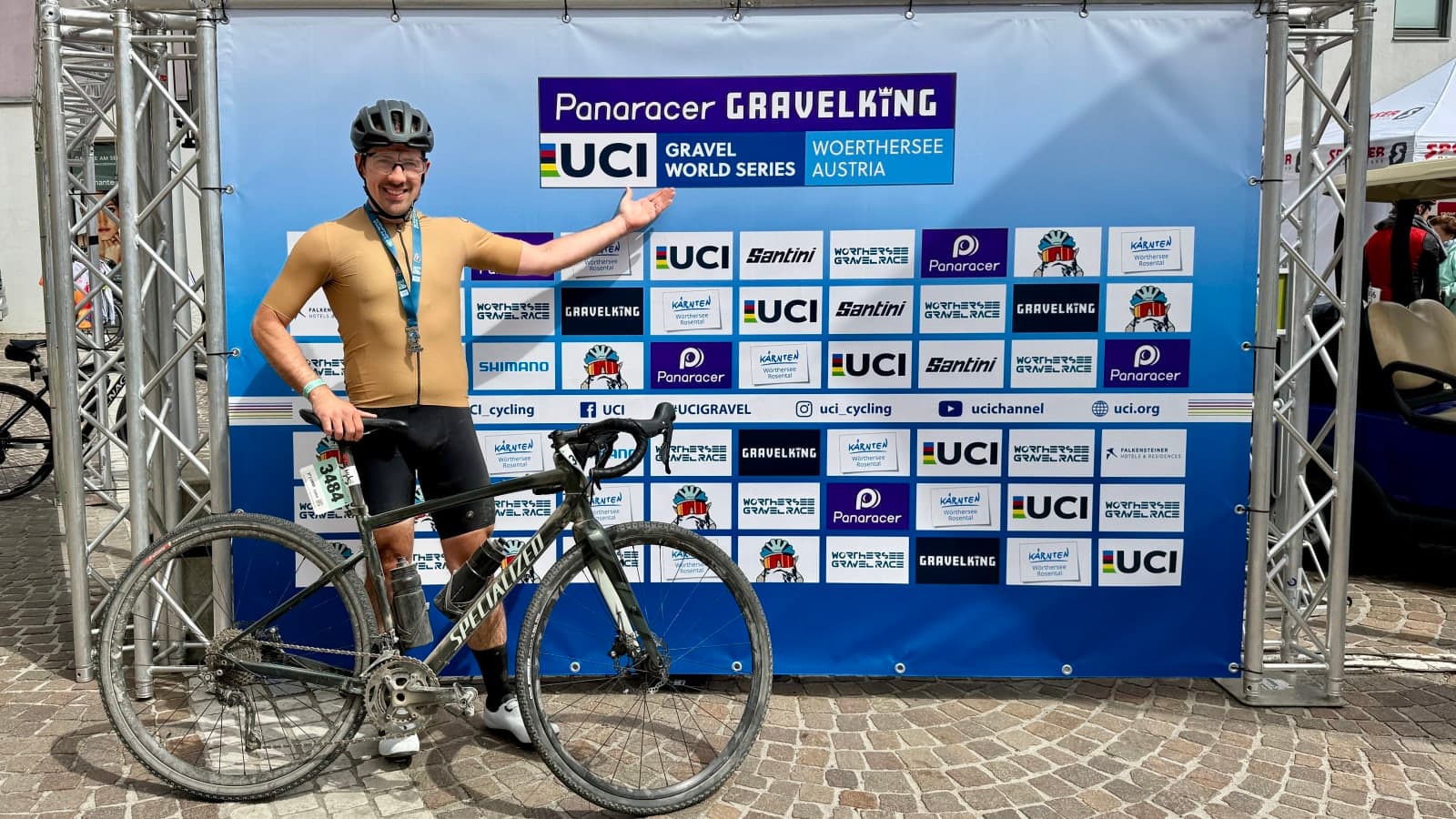 Finisher photo after Wörthersee Gravel Race 2026 with bike and medal.