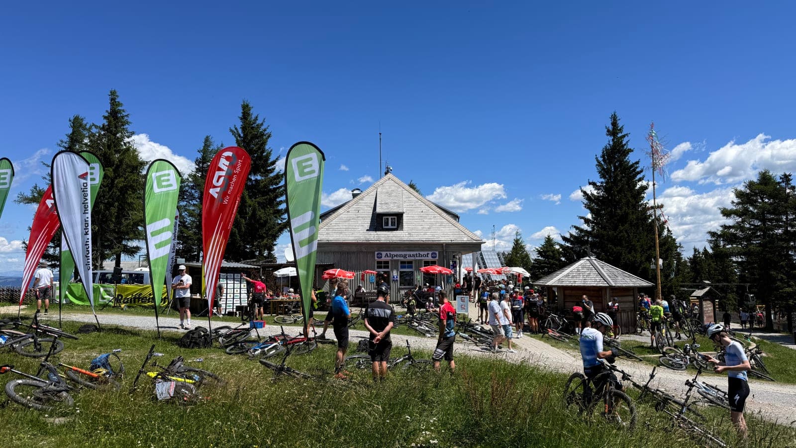 Schockl Gipfelsturm 2026 summit finish area near Alpengasthof Schockl with riders and KTM Challenge banners.