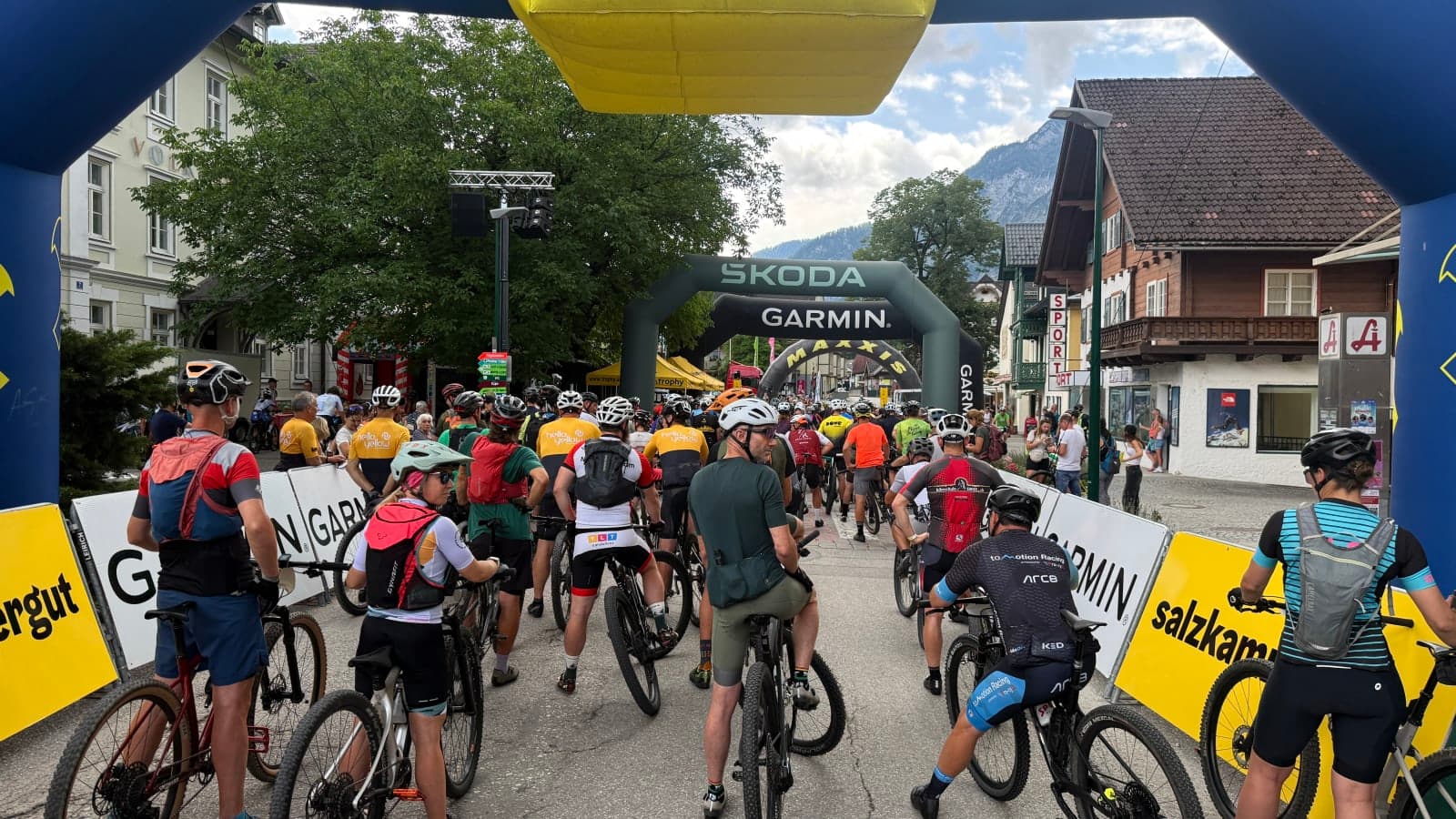Salzkammergut Trophy 2026 riders assembled beneath the start gantry in Bad Goisern, Austria.