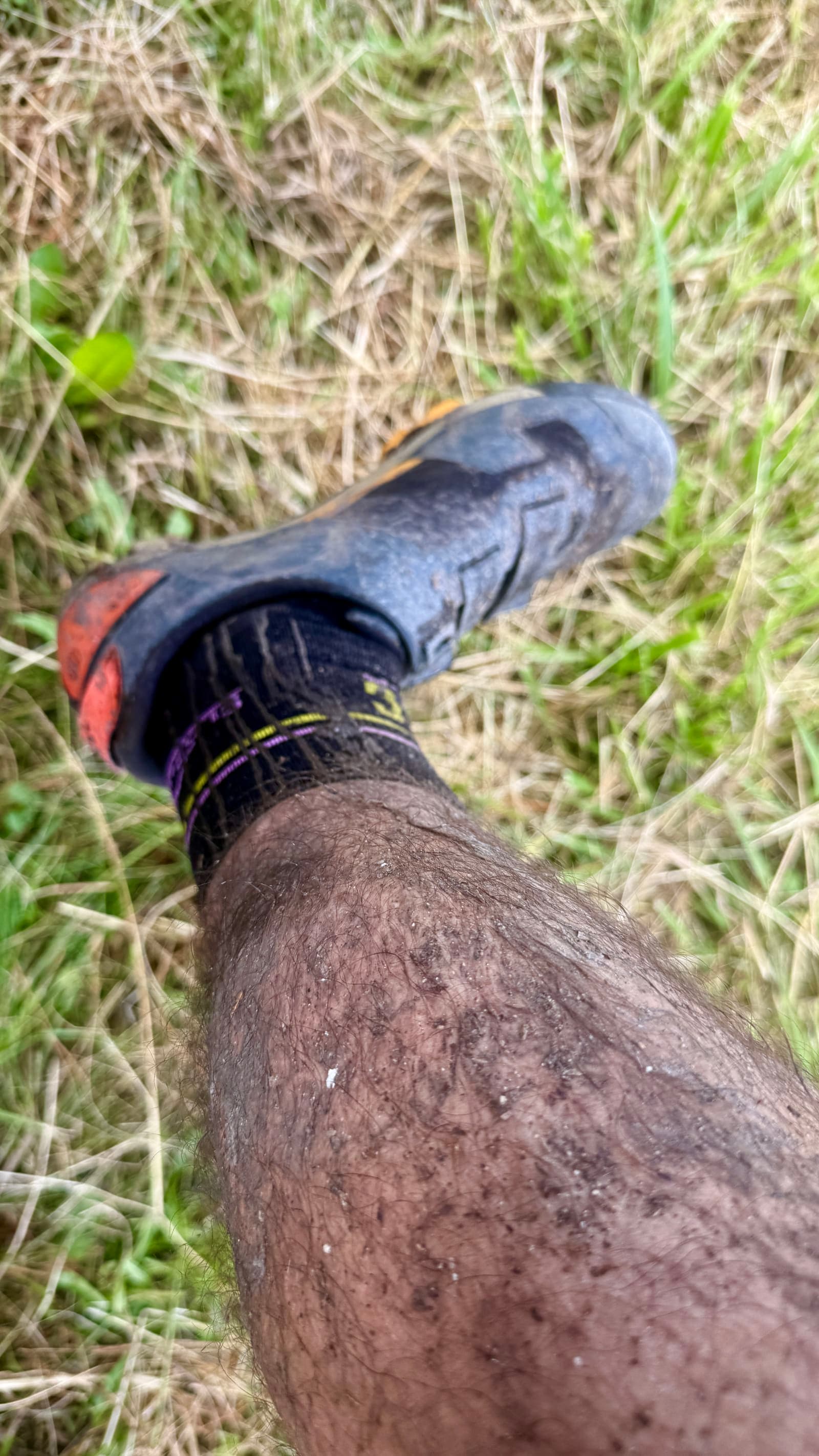 Mud-covered leg after racing Course D at Salzkammergut Trophy 2026.